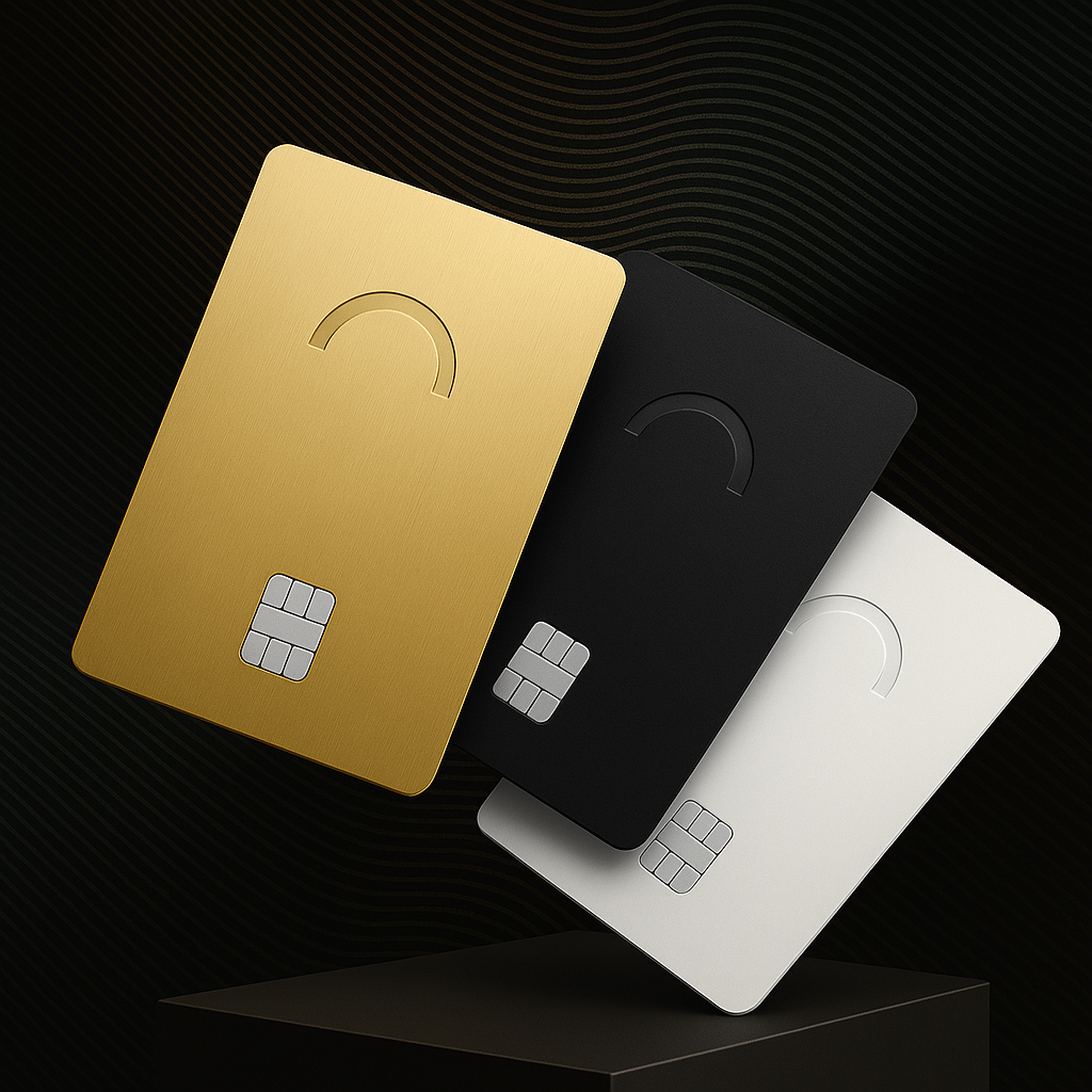Three premium Goldbridge credit cards in gold, black, and white